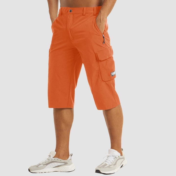 "Short cargo homme séchage rapide, multiples poches, design moderne et pratique, idéal aventure été."