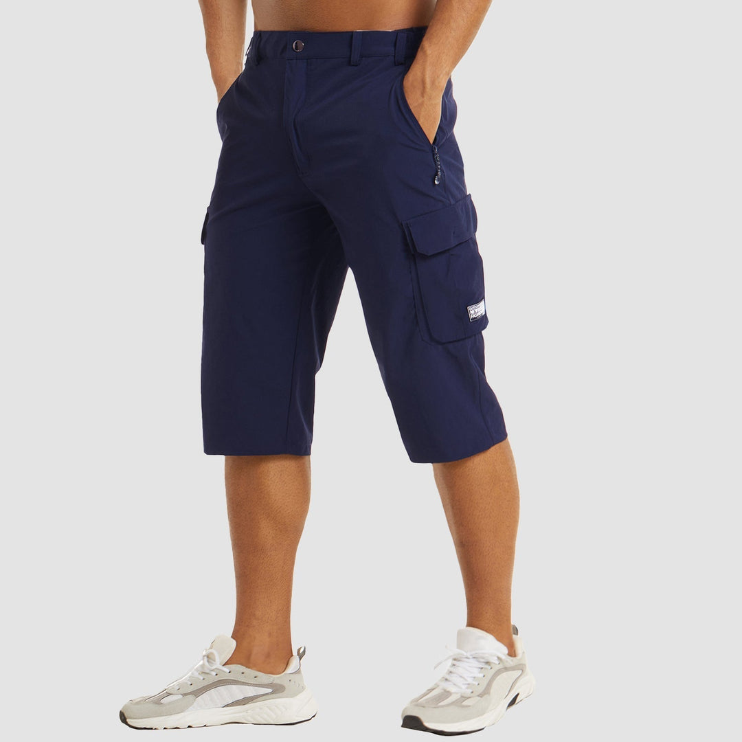 "Short cargo homme séchage rapide, multiples poches, design moderne et pratique, idéal aventure été."