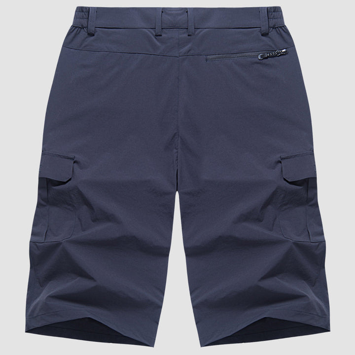 "Short cargo homme séchage rapide, multiples poches, design moderne et pratique, idéal aventure été."