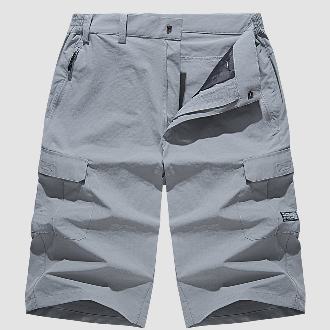 "Short cargo homme séchage rapide, multiples poches, design moderne et pratique, idéal aventure été."