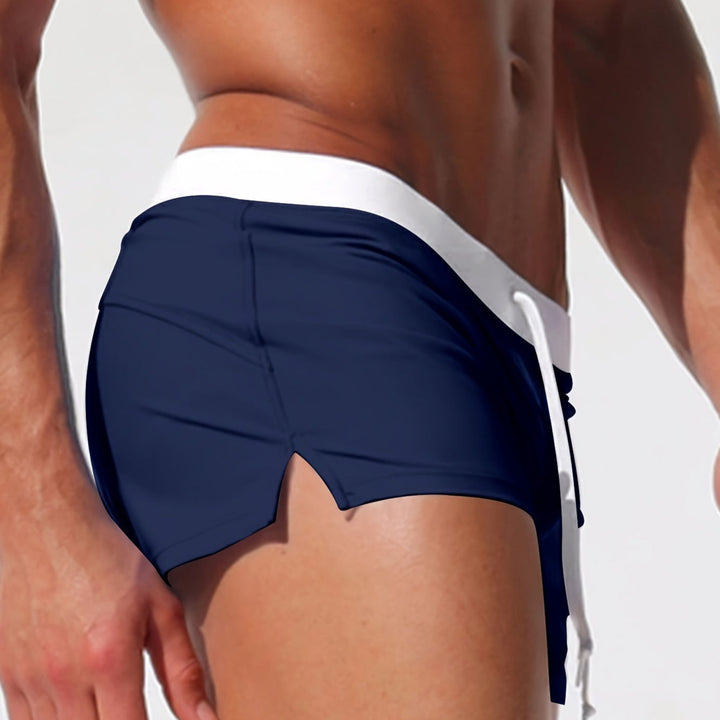 "Short de bain homme élégance moderne, taille élastique, confort plage, couleurs bleu ciel, gris clair, bleu marine."
