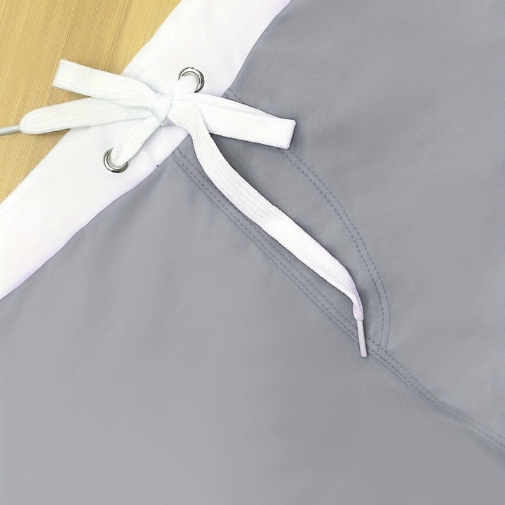 "Short de bain homme élégance moderne, taille élastique, confort plage, couleurs bleu ciel, gris clair, bleu marine."