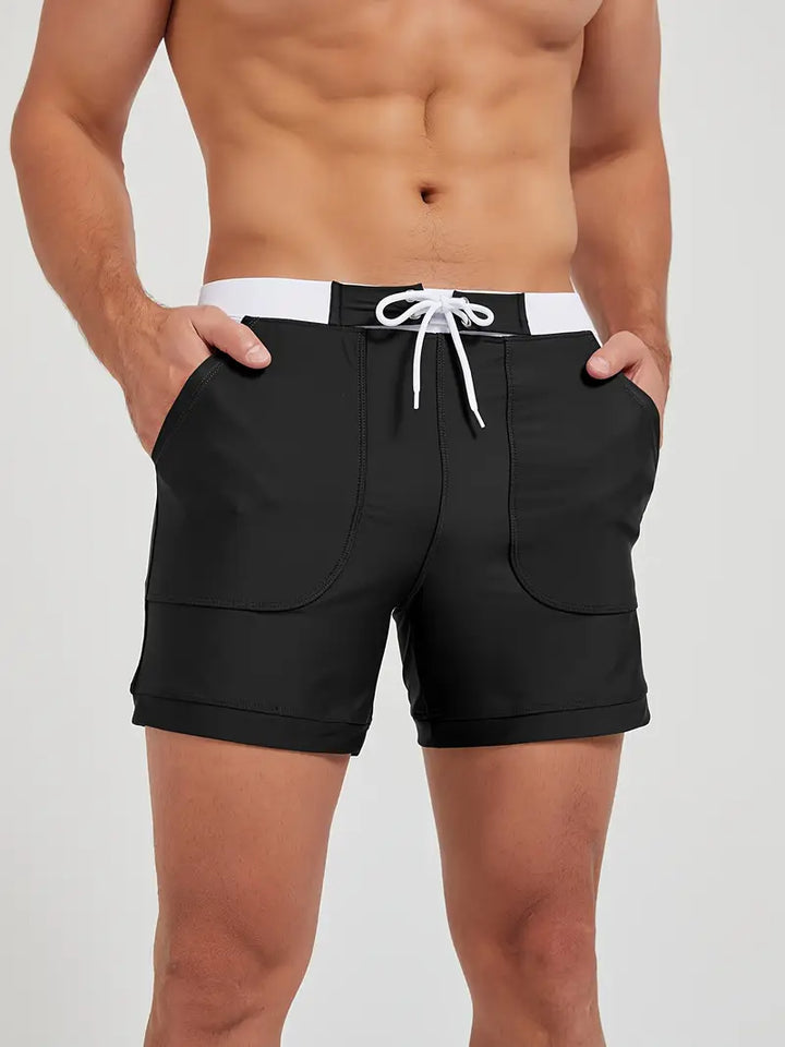 "Short de bain homme séchage rapide, tissu léger, style minimaliste, parfait pour l'été et les journées ensoleillées."