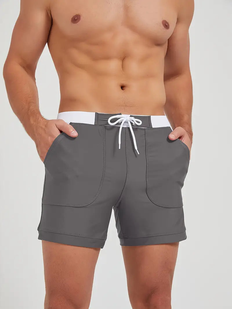 "Short de bain homme séchage rapide, tissu léger, style minimaliste, parfait pour l'été et les journées ensoleillées."