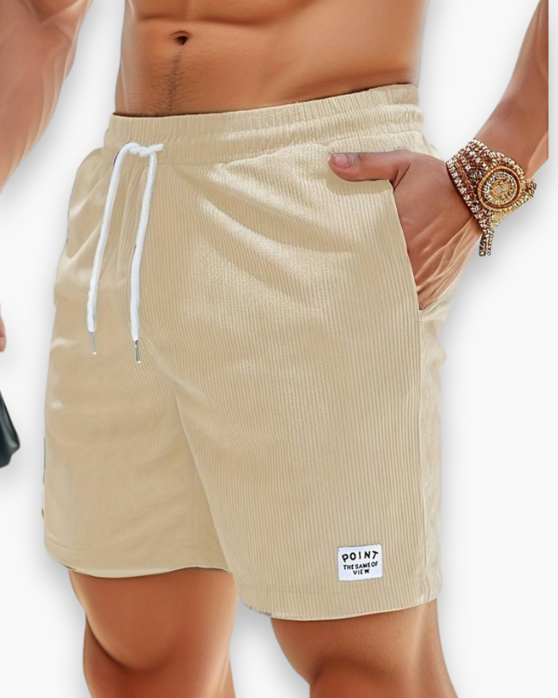 "Shorts d'été décontractés pour homme en tissu léger, design moderne, idéals pour journées chaudes et activités extérieures."