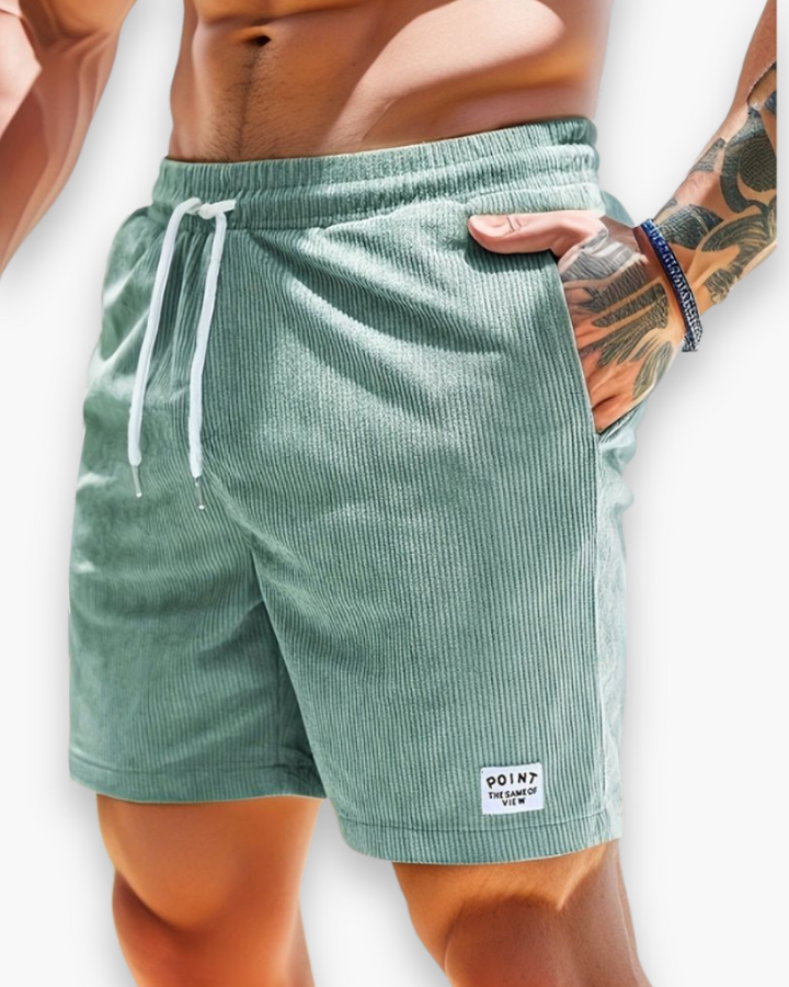 "Shorts d'été décontractés pour homme en tissu léger, design moderne, idéals pour journées chaudes et activités extérieures."