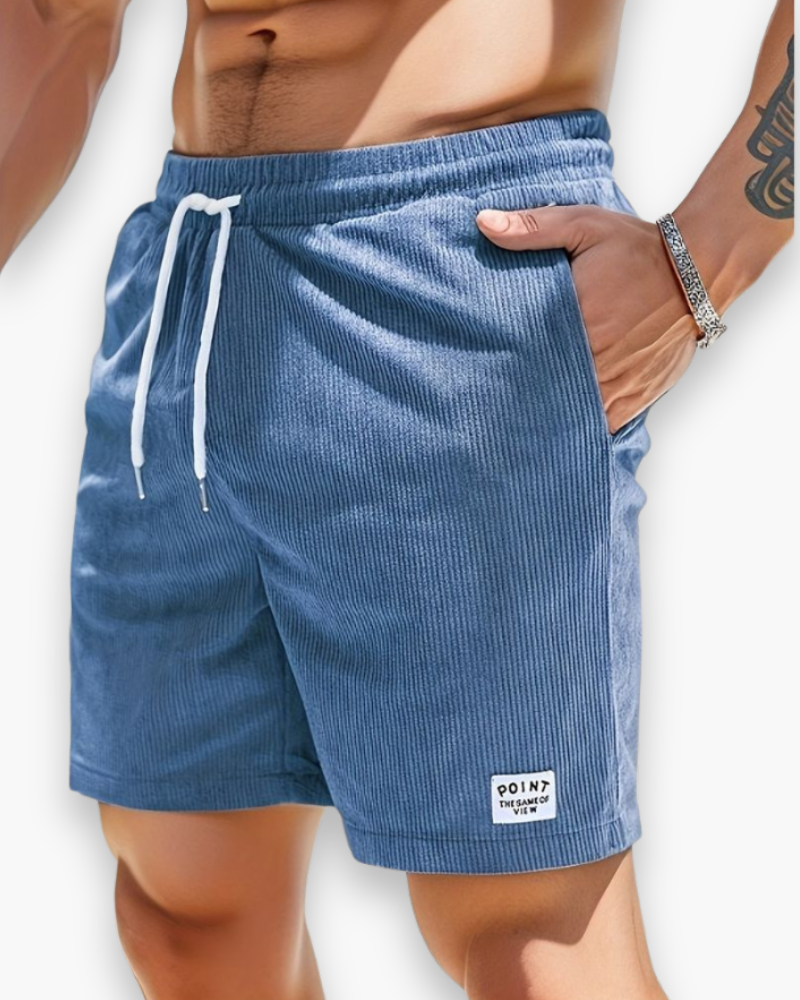 "Shorts d'été décontractés pour homme en tissu léger, design moderne, idéals pour journées chaudes et activités extérieures."