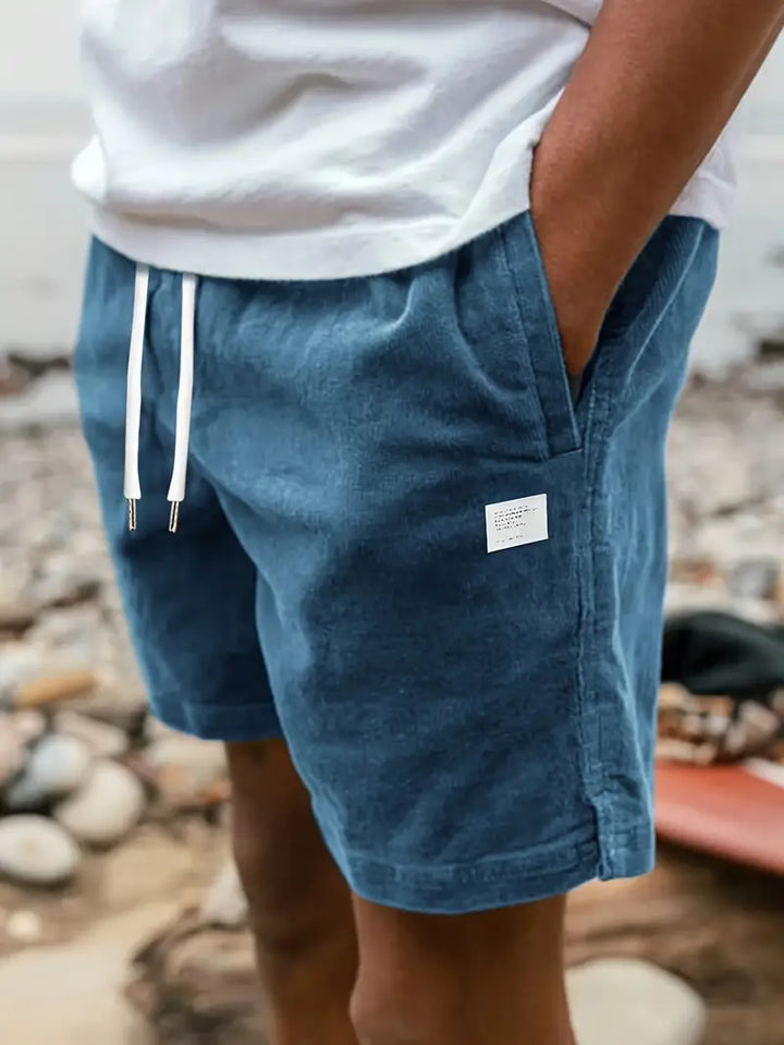 "Shorts Graig bleus pour hommes, coupe moderne, confort estival, légers, adaptés à toutes les occasions."