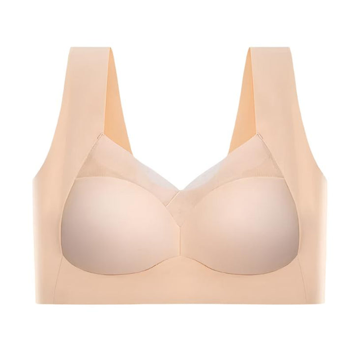 Soutien-gorge sans couture, beige, confortable, épousant la silhouette, idéal sous vêtements moulants, matière douce.