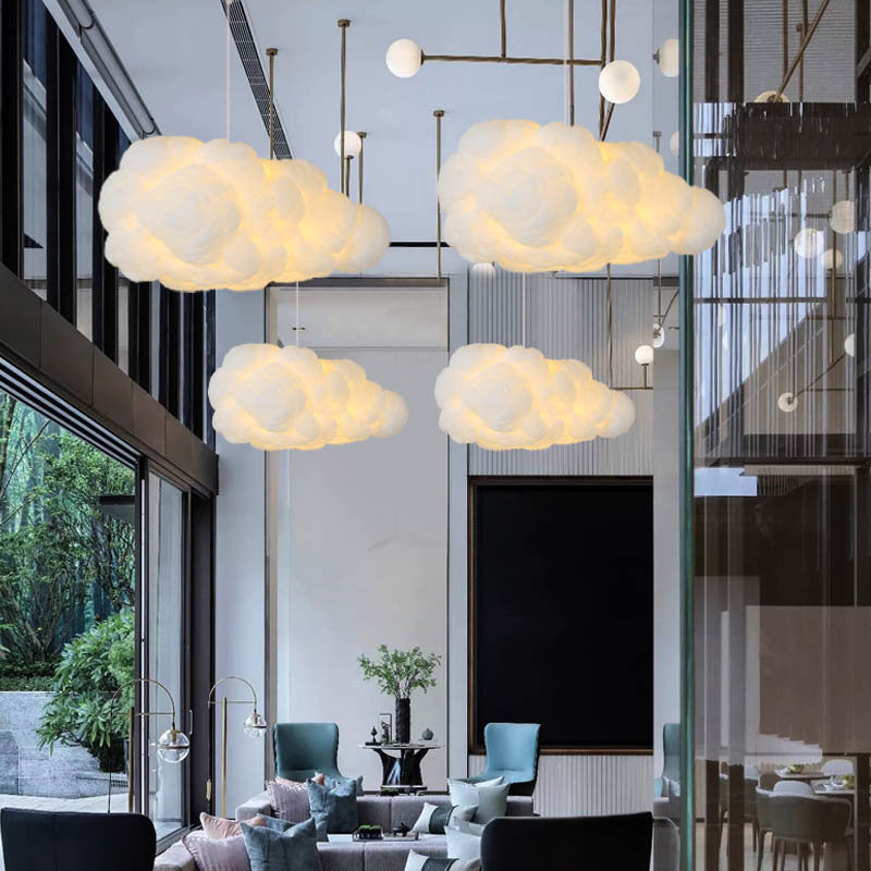 "Suspension nuage moderne blanche, luminaire aérien design pour intérieur contemporain, ambiance apaisante et élégante."