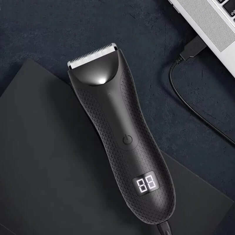 "Tondeuse corps homme étanche avec design ergonomique et indicateur LED, idéale pour un rasage précis et confortable."