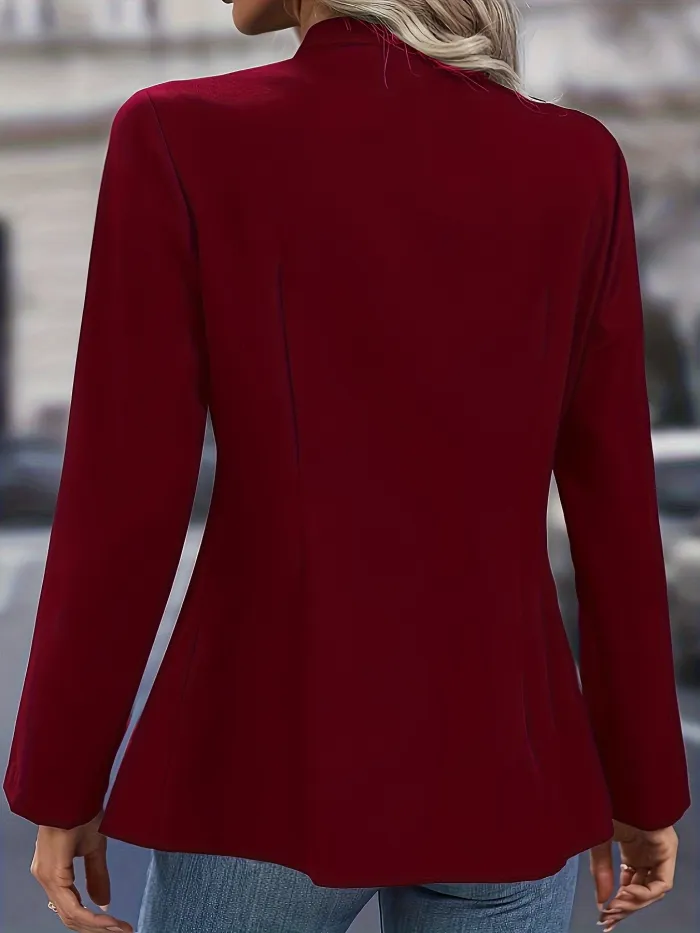 "Veste ajustée élégante bleu foncé pour femme, style professionnel et confort pour le bureau"