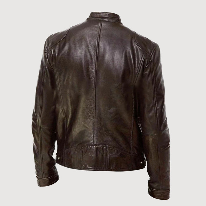"Veste de moto homme effet cuir, look moderne et structuré, allure haut de gamme, confort et détails pratiques visibles."