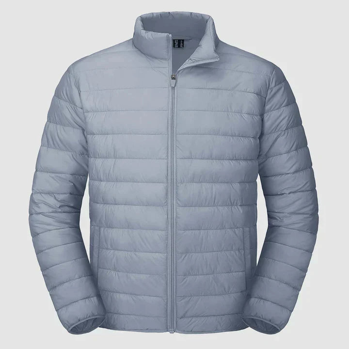 Veste d'hiver matelassée pour homme en noir, coupe moderne, col montant, isolation thermique pour un confort optimal.