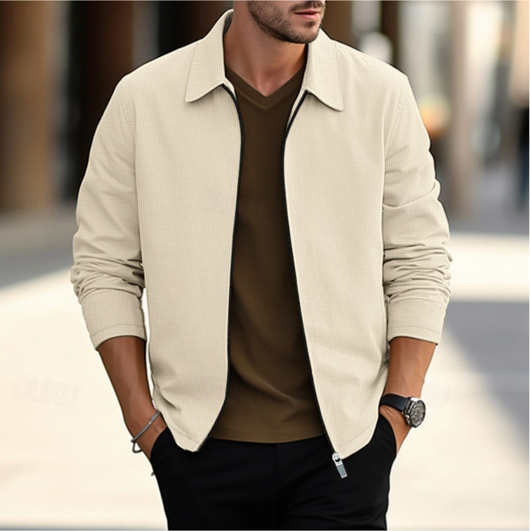Veste élégante homme en tissu de qualité, couleurs variées, adaptée pour travail ou détente, alliant confort et style.
