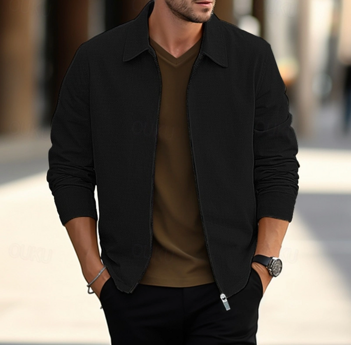 Veste élégante homme en tissu de qualité, couleurs variées, adaptée pour travail ou détente, alliant confort et style.