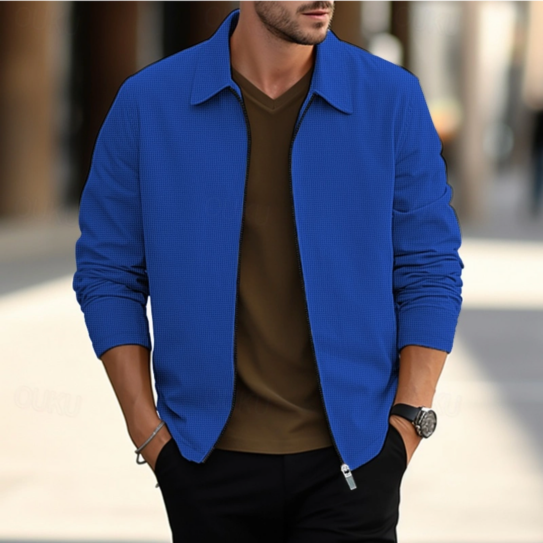 Veste élégante homme en tissu de qualité, couleurs variées, adaptée pour travail ou détente, alliant confort et style.