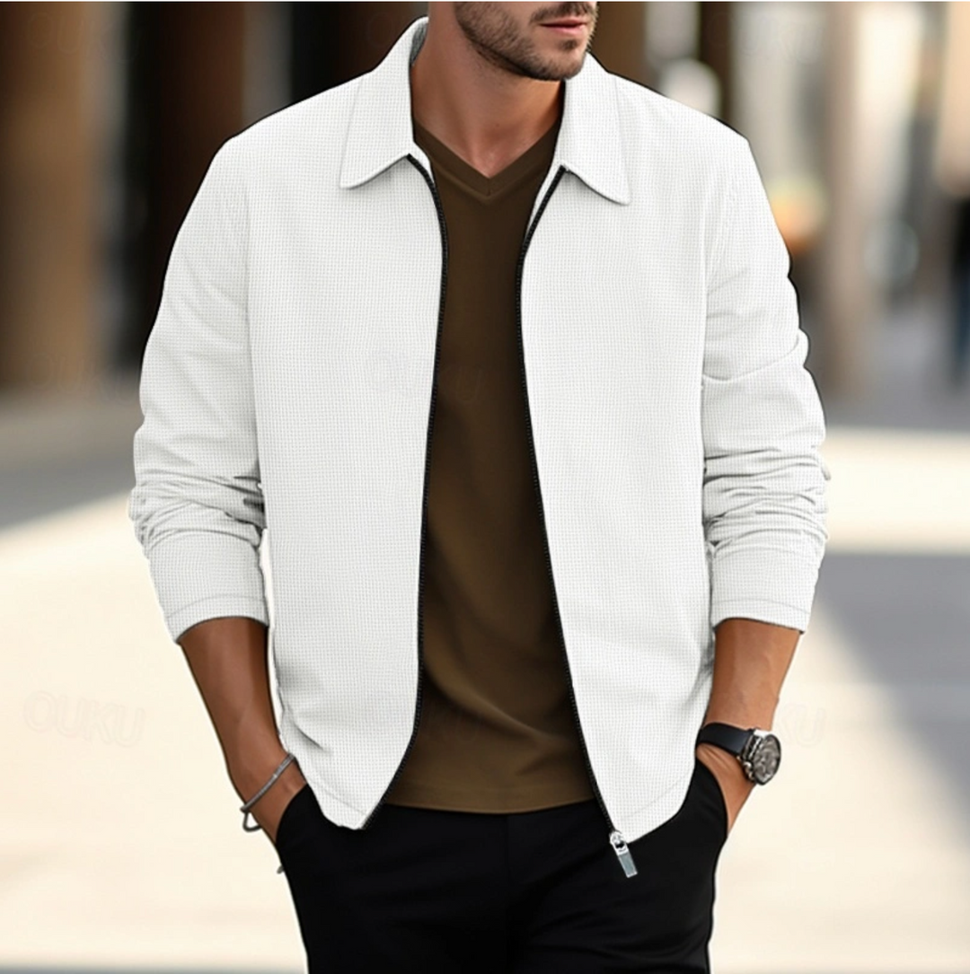 Veste élégante homme en tissu de qualité, couleurs variées, adaptée pour travail ou détente, alliant confort et style.