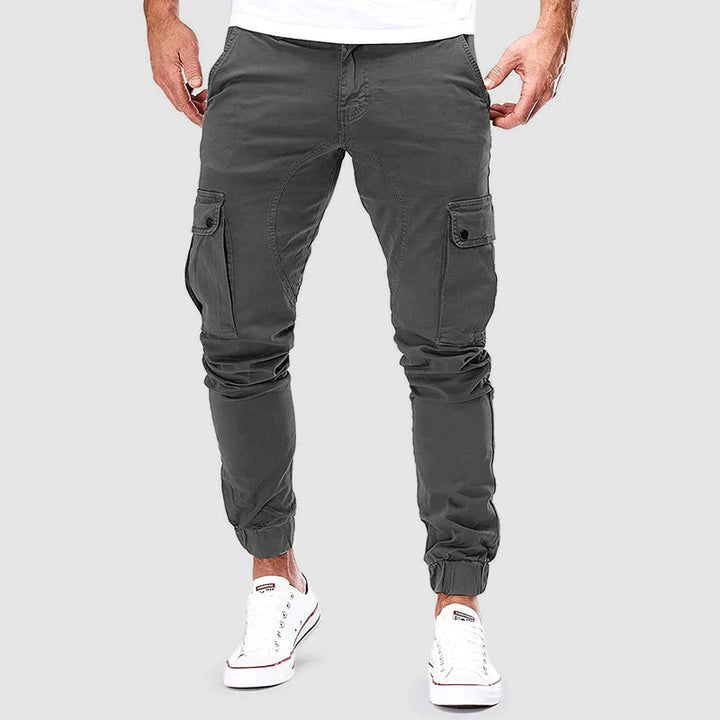 "Visuel pantalon cargo homme décontracté, coton, poches multiples, khaki, confortable et moderne pour aventure urbaine."