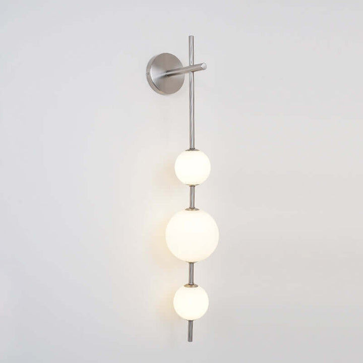 Applique Murale Globe Vertical - Éclairage Minimaliste Chic