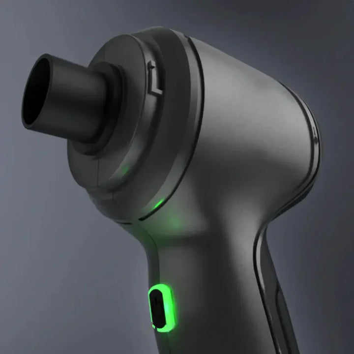 "Aspirateur souffleur design compact 2-en-1 performant pour nettoyage efficace maison voiture, filtre lavable, USB-C charge."
