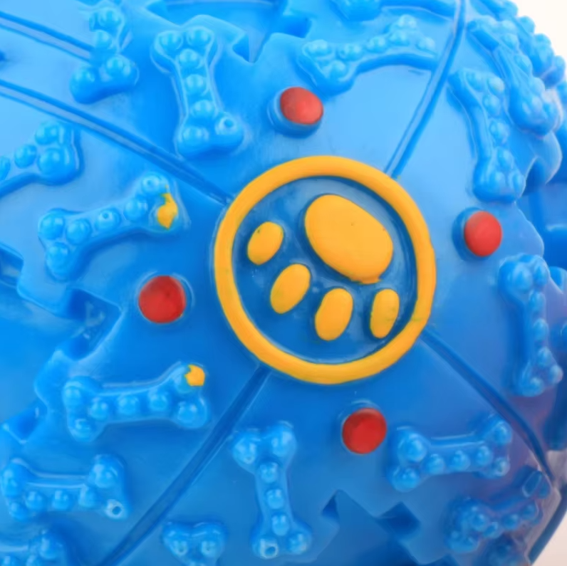 "Balle interactive pour chien, couleur vive, distributeur de friandises, stimulation mentale, son intégré, jeu durable."