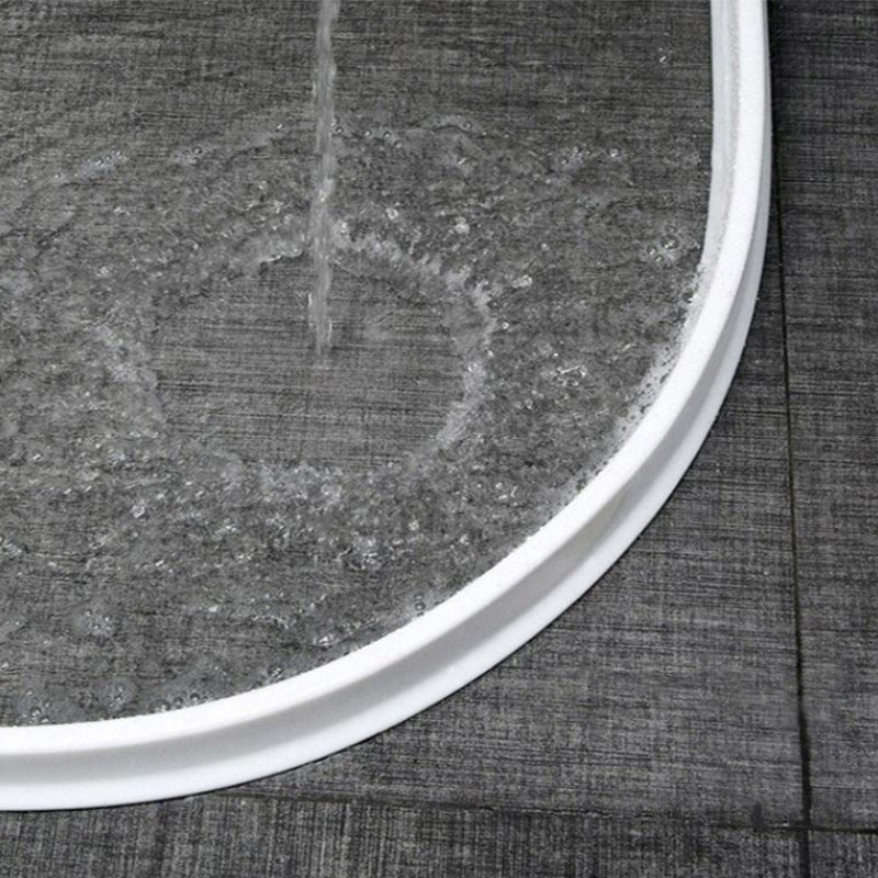Barrière de douche en silicone flexible, étanche, transparente, s'installe facilement pour empêcher les fuites d'eau.