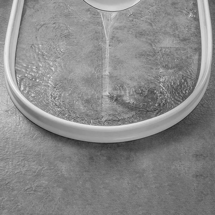 Barrière de douche en silicone flexible, étanche, transparente, s'installe facilement pour empêcher les fuites d'eau.