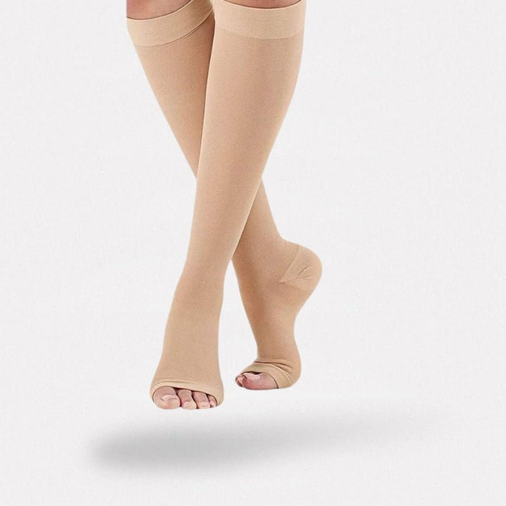 "Bas de compression courts noirs, soutien au quotidien et sport, design élégant, matériau respirant, taille S-XXL."