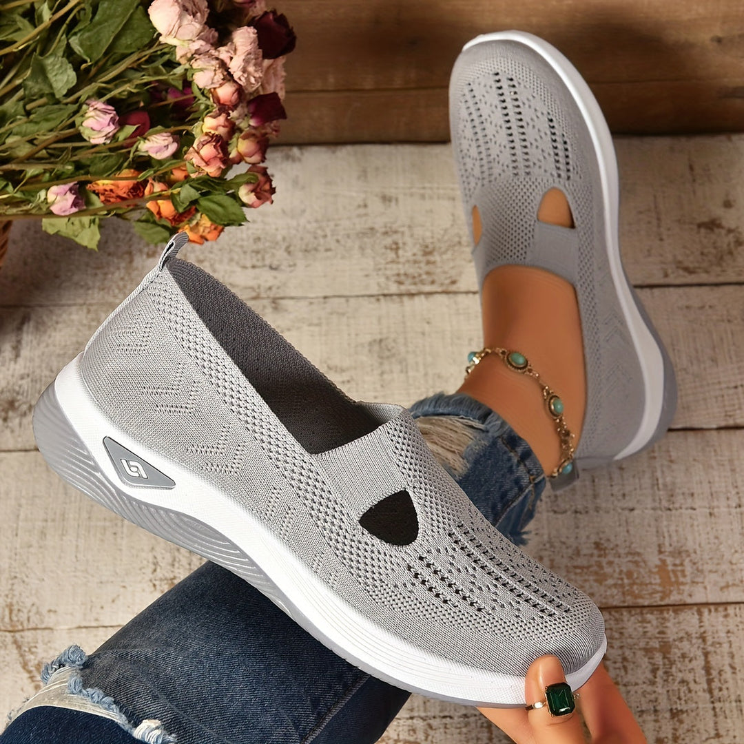 "Baskets féminines sans lacets, style moderne, matériau respirant et extensible, confort pour usage quotidien."