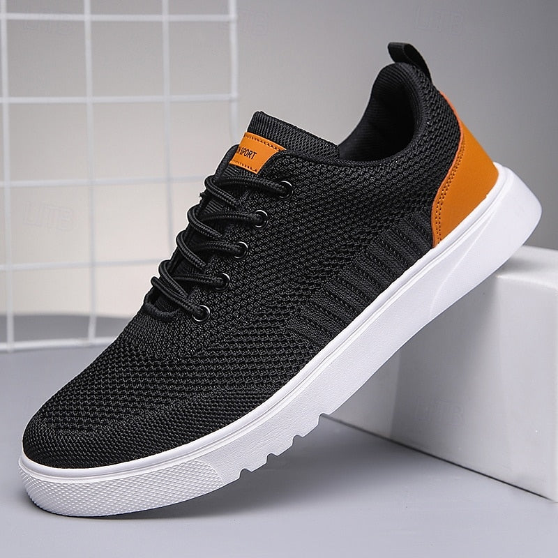 "Baskets Julien pour homme, design moderne et respirant, légères, en tissu gris, semelle blanche, style décontracté."