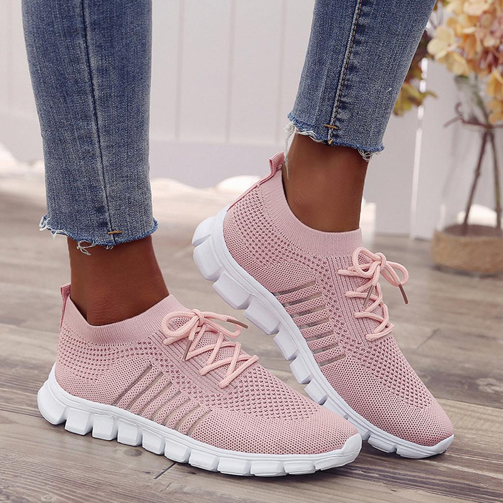 "Baskets orthopédiques femme, design moderne, tissu respirant gris, semelle orthopédique pour confort et soutien optimal."