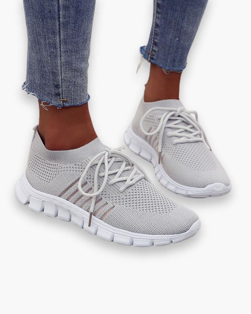 "Baskets respirantes pour femme, légères avec semelle épaisse, tissu ventilé, idéales pour confort quotidien."