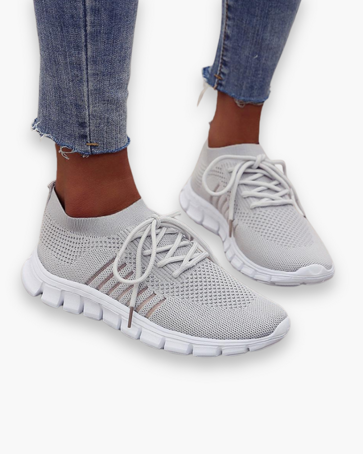 "Baskets respirantes pour femme, légères avec semelle épaisse, tissu ventilé, idéales pour confort quotidien."
