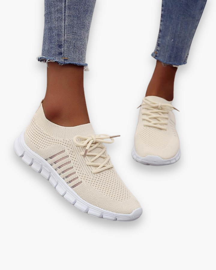 "Baskets respirantes pour femme, légères avec semelle épaisse, tissu ventilé, idéales pour confort quotidien."