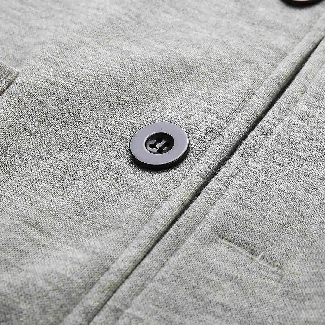 Blazer élégant homme avec poches multiples, coupe chic et moderne, couleur neutre, parfait pour toutes occasions.