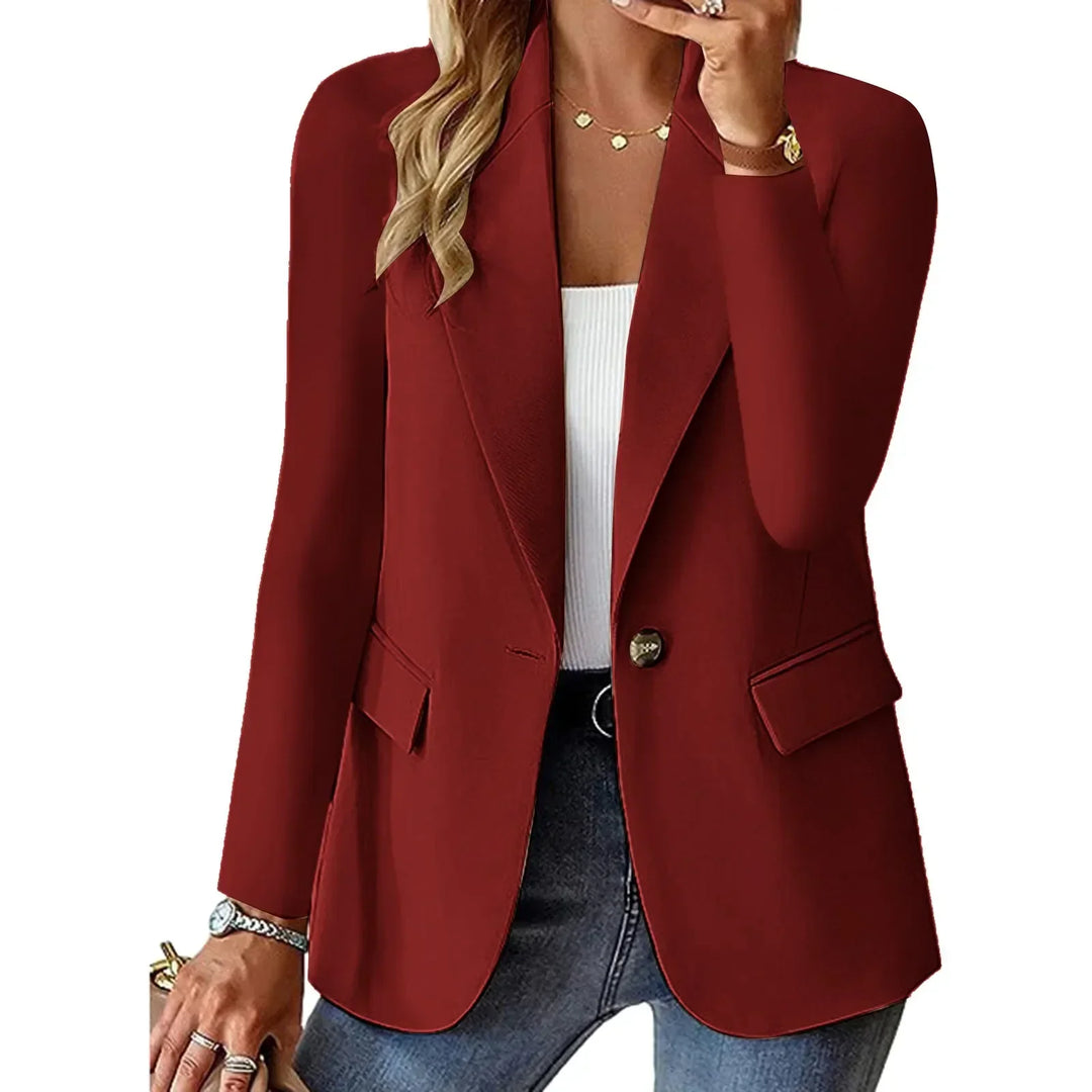"Blazer long élégant femme face, coupe ajustée, lignes épurées, style moderne, multiples couleurs disponibles."