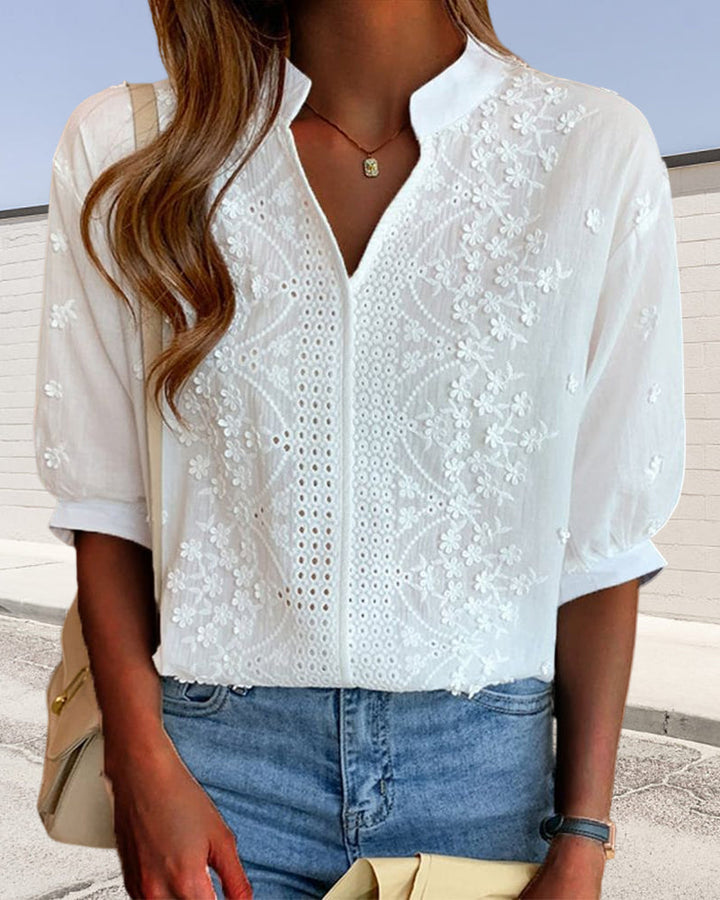Blouse chic à manches bouffantes, élégante et moderne, idéale pour sortie ou bureau, avec style et confort polyvalents.