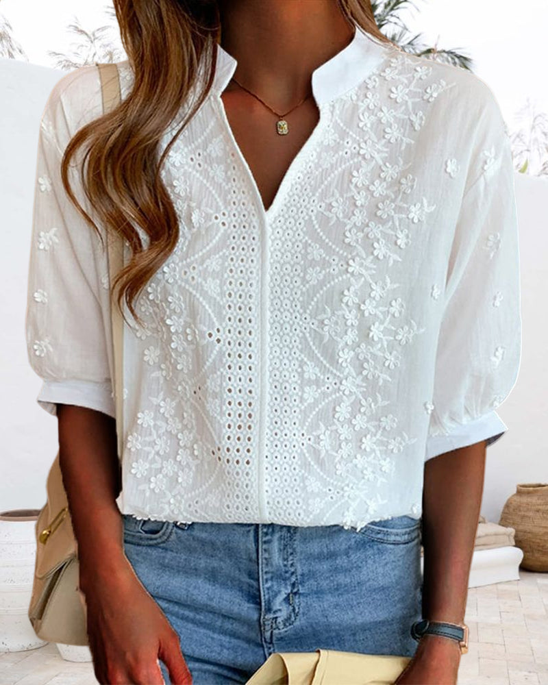 Blouse chic à manches bouffantes, élégante et moderne, idéale pour sortie ou bureau, avec style et confort polyvalents.