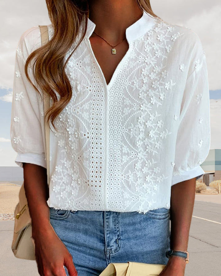Blouse chic à manches bouffantes, élégante et moderne, idéale pour sortie ou bureau, avec style et confort polyvalents.