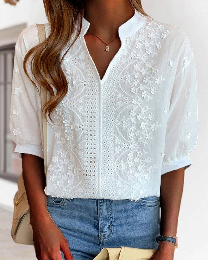 Blouse chic à manches bouffantes, élégante et moderne, idéale pour sortie ou bureau, avec style et confort polyvalents.