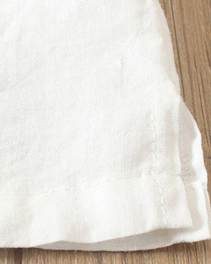 Blouse chic à manches courtes, col rond, en coton doux. Élégante et confortable, idéale pour toutes les occasions.