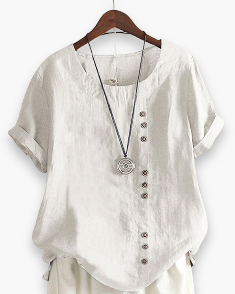 Blouse d'été décontractée, légère et boutonnée, pour femme, chic, avec tissu fluide et détails raffinés.