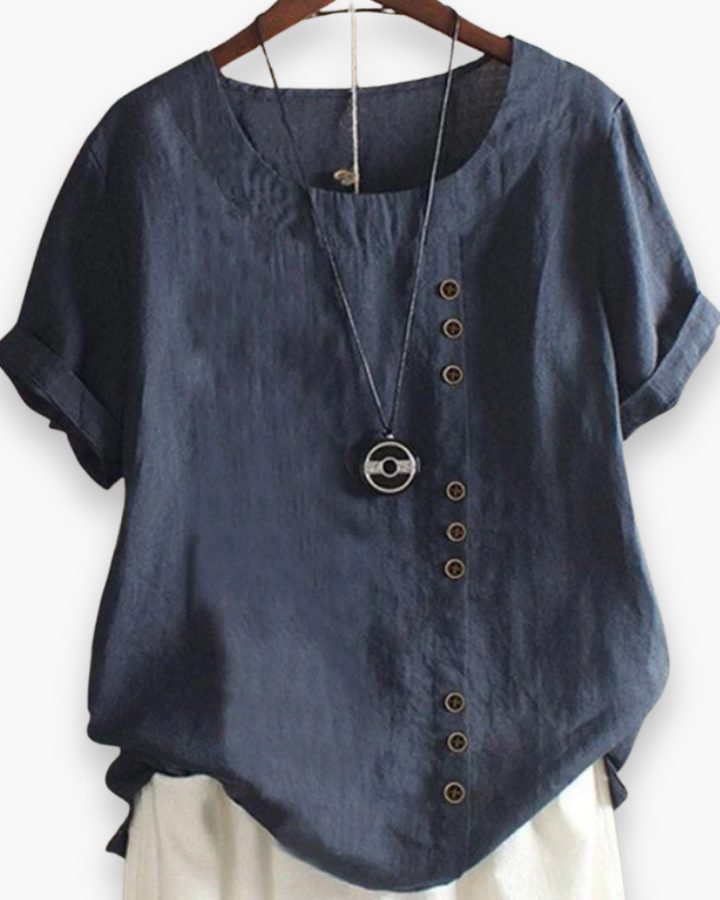 Blouse d'été décontractée, légère et boutonnée, pour femme, chic, avec tissu fluide et détails raffinés.