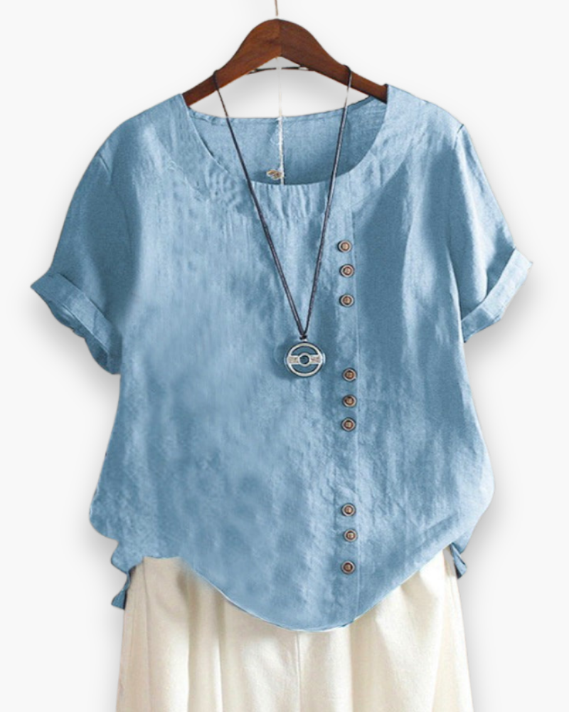 Blouse d'été décontractée, légère et boutonnée, pour femme, chic, avec tissu fluide et détails raffinés.