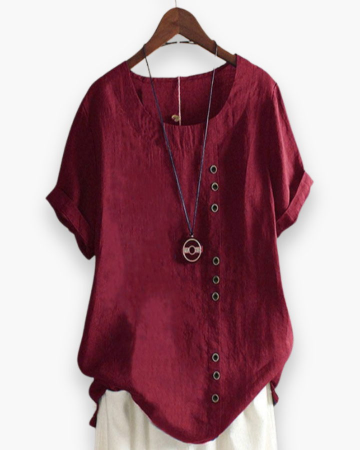 Blouse d'été décontractée, légère et boutonnée, pour femme, chic, avec tissu fluide et détails raffinés.
