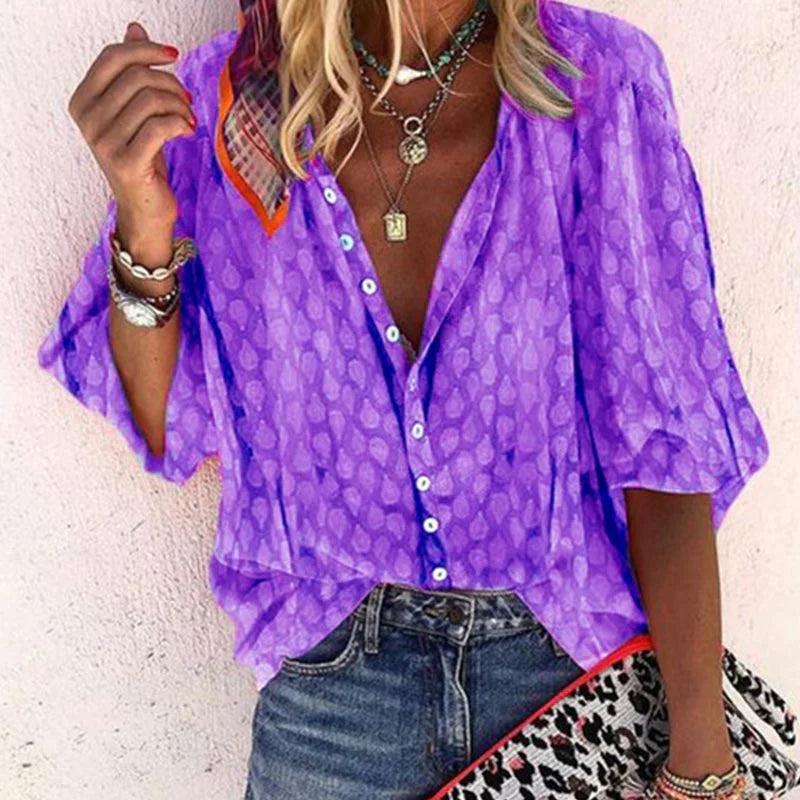 Blouse d'été femme légère et élégante, coupe fluide, parfaite pour looks d'été raffinés et confortables.