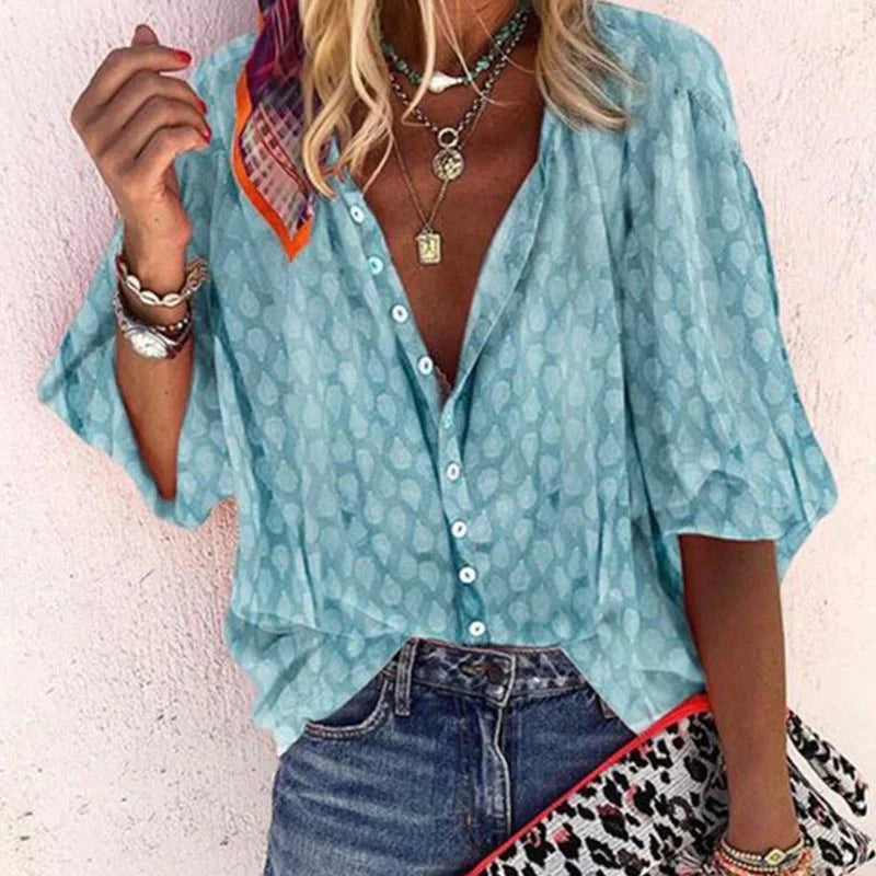 Blouse d'été femme légère et élégante, coupe fluide, parfaite pour looks d'été raffinés et confortables.