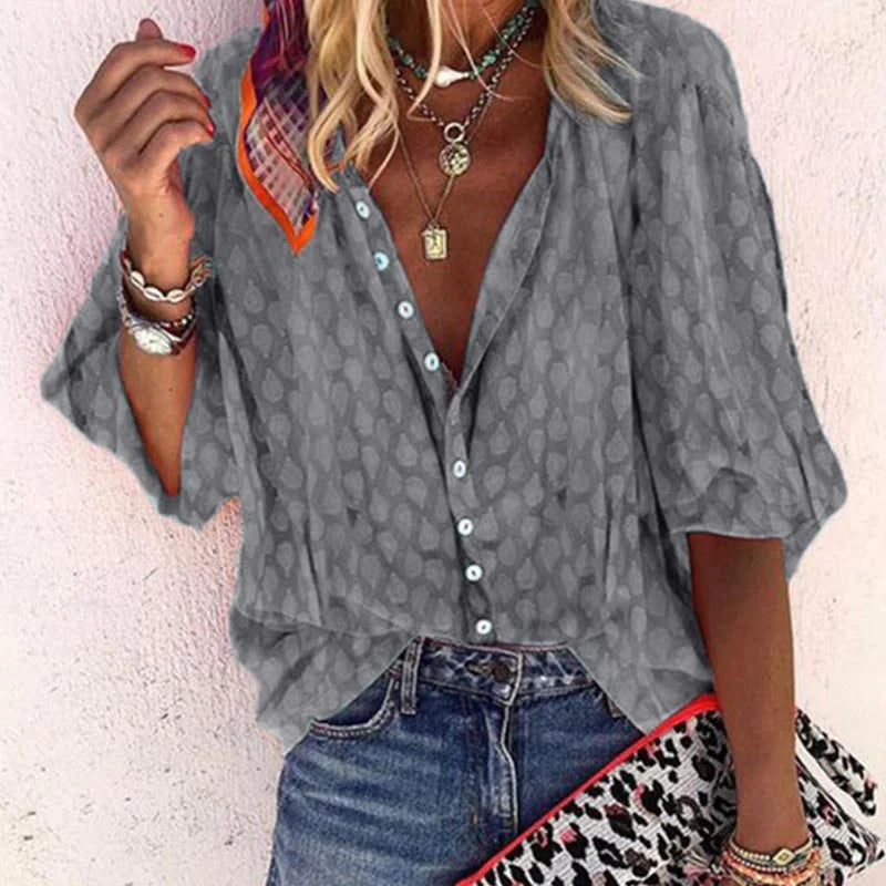 Blouse d'été femme légère et élégante, coupe fluide, parfaite pour looks d'été raffinés et confortables.