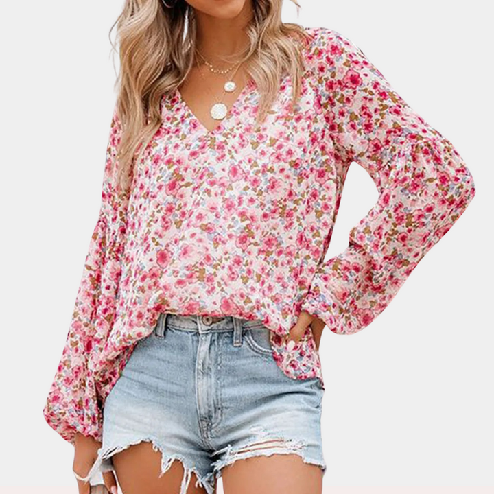 Blouse d'été imprimé floral femme, blanc élégant, tissu léger, pour un style chic et confortable par temps ensoleillé.